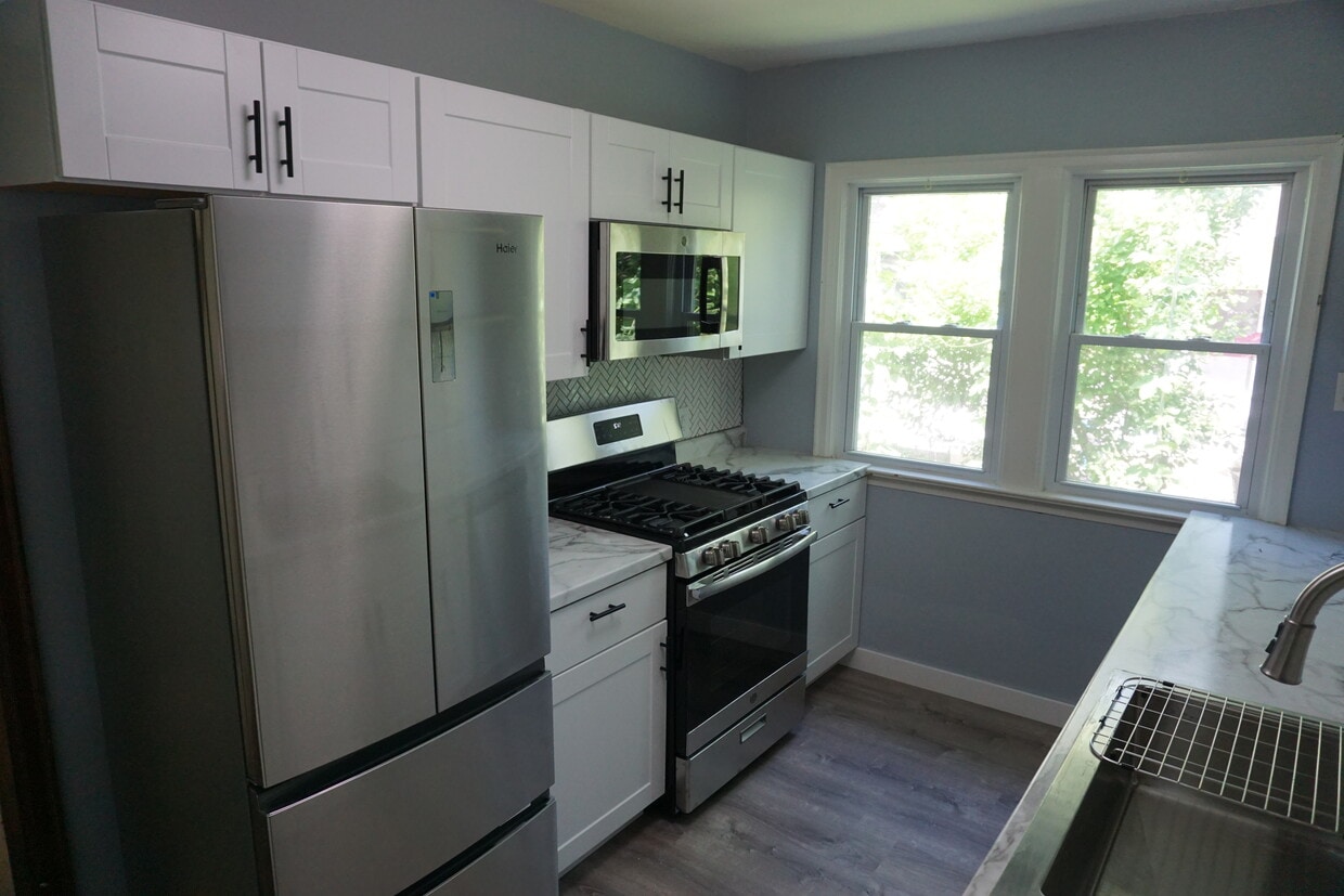 Newly remodeled kitchen with stainless steel appliances. - 5047 44th Ave S
