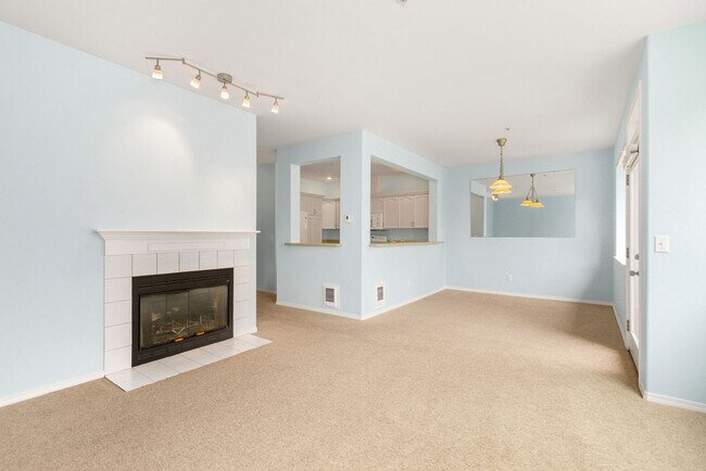 Building Photo - Spacious 2-Bed, 2-Bath Condo with Large Ga...
