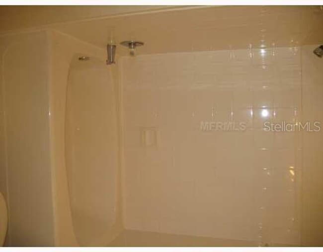 Building Photo - Very nice 2bed/1bath condo on 2nd floor in gated Enclave at Richmond place in New Tampa!