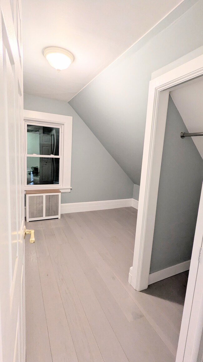 Second bedroom with new oak hardwood flooring - 536 Bridge St