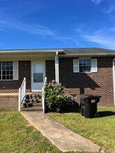 Building Photo - 101-103 Teakwood Dr