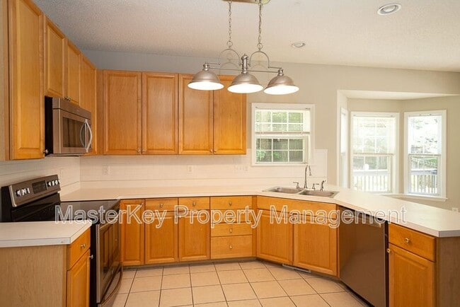 Building Photo - 7916 Strawberry Meadows St