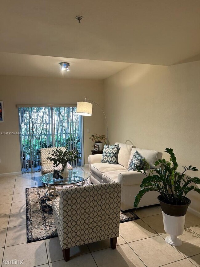 Foto del edificio - 3 br, 2 bath Condo - 11605 NW 89th St