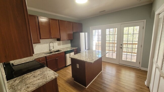 Building Photo - Spacious Three-Level Townhome with Finished Basement in Convenient Garner Location