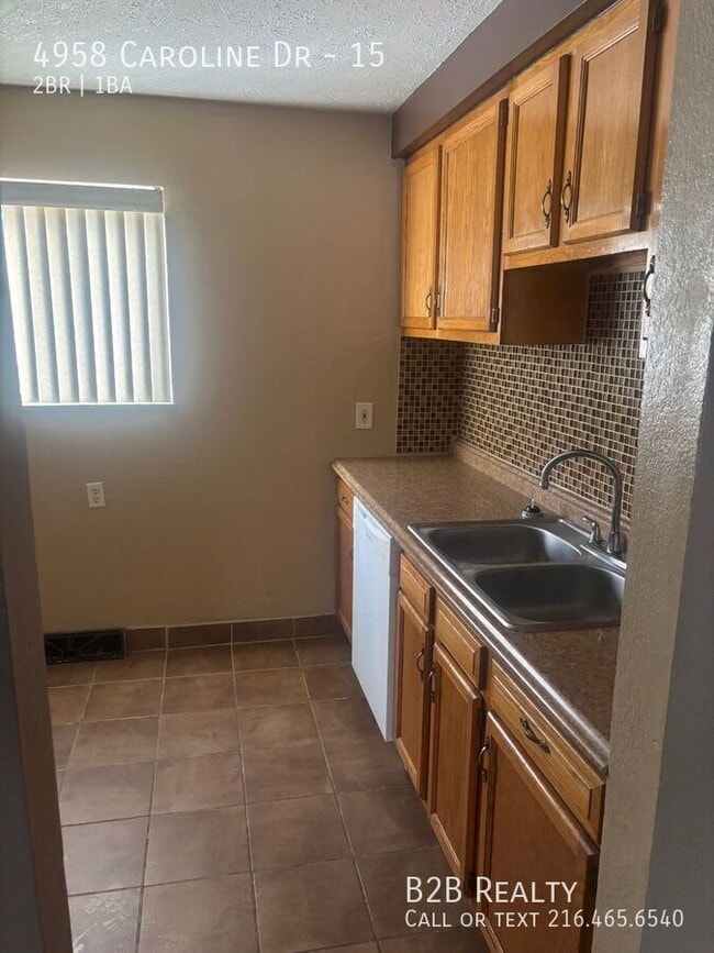 Building Photo - 4958 Caroline Dr