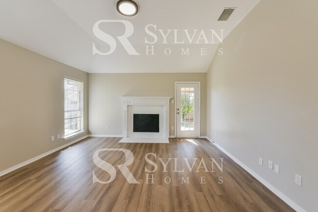Building Photo - Updated 4 bedroom home with garage!
