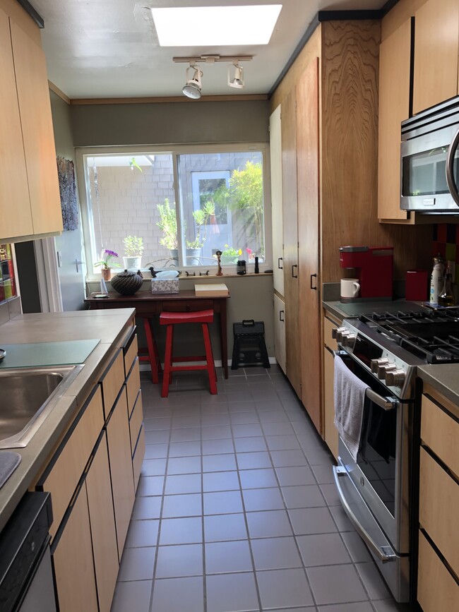 Galley kitchen looking toward atrium - 96 Biscayne Dr
