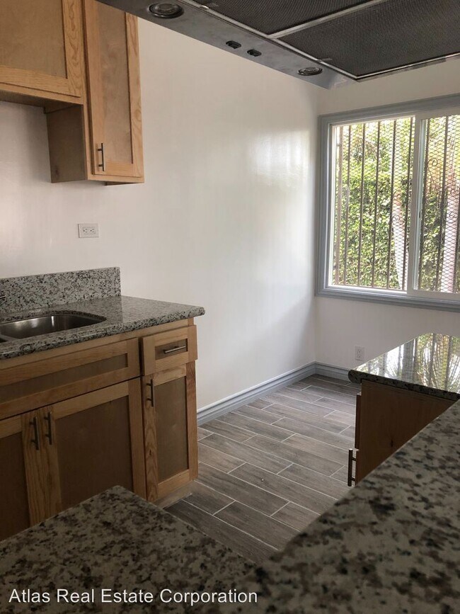 Foto del edificio - 1226 1/2-1226 W 106th St