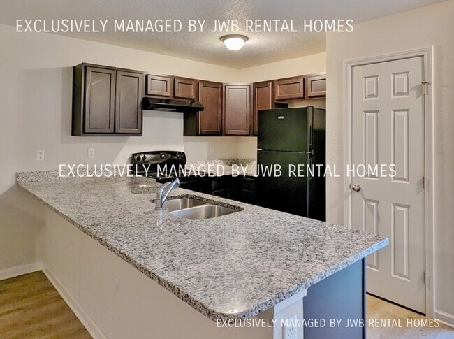 Foto del edificio - 6793 Lake Mist Ln