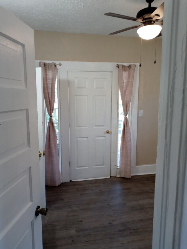 Bedrom with balcony door - 1119 W Augusta Ave