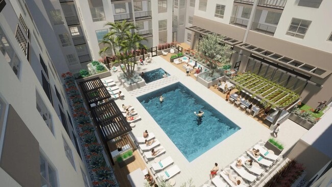 A sun-filled courtyard with a central pool, shaded lounge areas, and spaces designed for gathering. - Modera Melrose