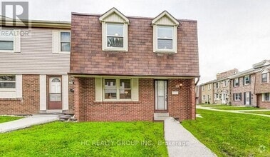 Building Photo - 2061-2061 Bridletowne Cir