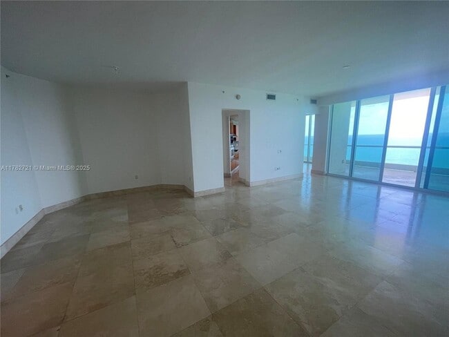 Building Photo - 16047 Collins Ave