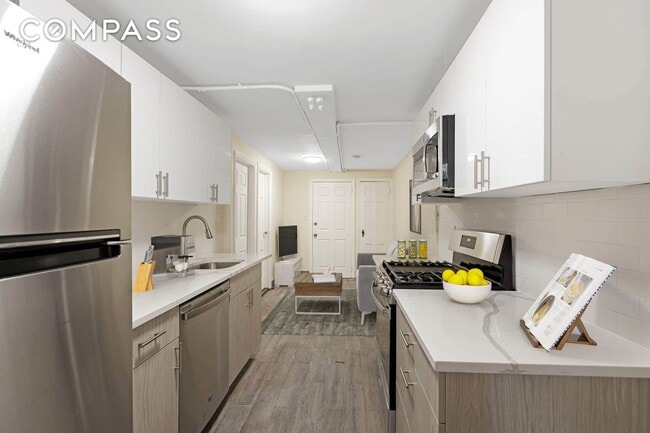 Photo - 32-84-84 46th St Townhome