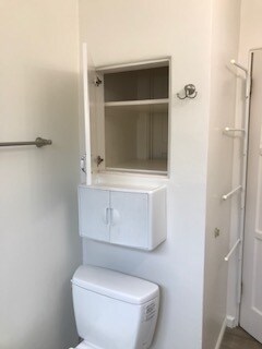 bathroom with storage, extra towel rods - 1679 Thomas Ave