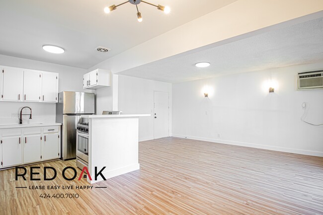 Building Photo - Spacious, Bright and Completely Remodeled ...