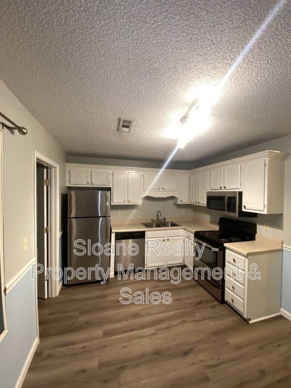 Building Photo - 6239 Lucille Dr