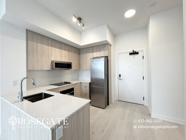 Photo du bâtiment - Modern 1-Bedroom Condo with Private Outdoor Space in Oakville