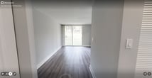 This contemporary 670 square foot apartment in Herndon, VA, offers a harmonious blend of style and functionality. The heart of the home is the newly renovated kitchen, boasting sleek white cabinetry, stainless steel appliances, and a subway tile backsplash. The L-shaped layout maximizes efficiency, while the peninsula provides additional counter space and casual dining options.

The open-concept living area seamlessly connects to the kitchen, creating an airy atmosphere. Large sliding glass doors flood the space with natural light and offer picturesque views of the surrounding greenery. The light gray walls and wood-look flooring throughout contribute to the modern aesthetic.

The spacious primary bedroom, measuring 180 square feet, features plush carpeting and ample closet space. The updated bathroom showcases a clean, minimalist design with a white tiled shower/tub combination and modern fixtures.

Additional highlights include recessed lighting throughout, window treatments for privacy, and a thoughtful floor plan that makes the most of the available space. The property's location at 176 Laurel Way provides a perfect balance of suburban tranquility and urban convenience.