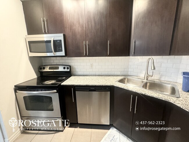 Building Photo - Modern 1-Bedroom Condo with 1.5 Bathrooms & Balcony – Mississauga