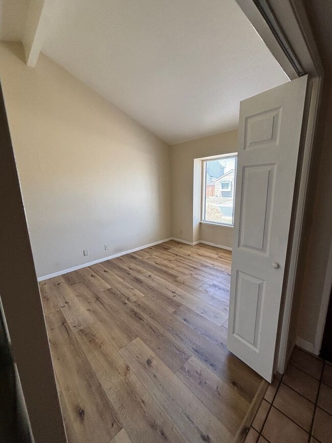 Building Photo - Spacious 4-Bedroom Home with Community Poo...