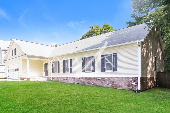 Building Photo - Feel welcome and comfortable in this spaci...