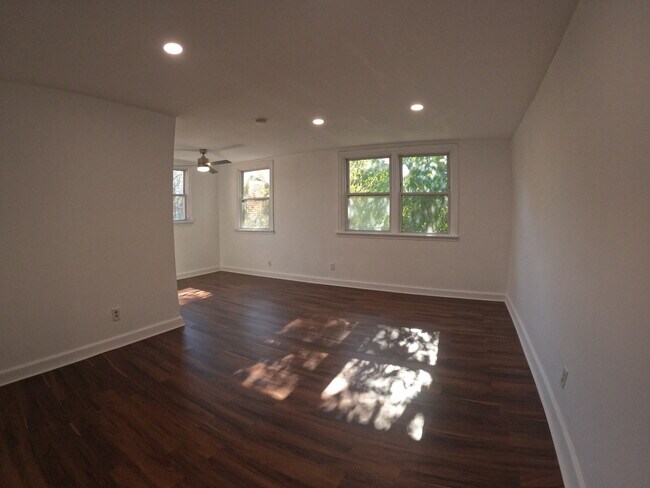 Living room and dining area - 869 W Walnut Ln