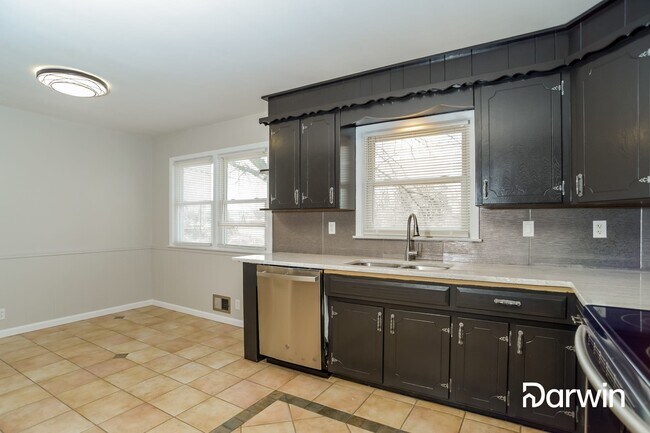 Building Photo - 5700 Cedar Avenue, Raytown, MO 64133