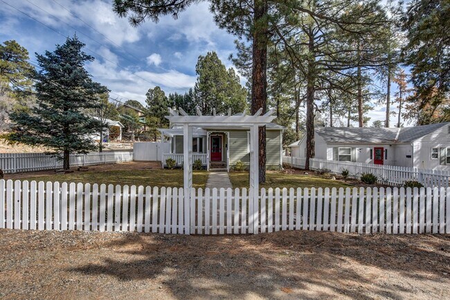 Building Photo - Complete With White Pickett Fence!