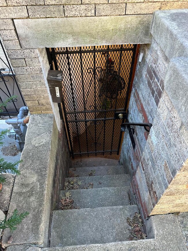 Stairs to lower level - 1336 Kenyon St NW