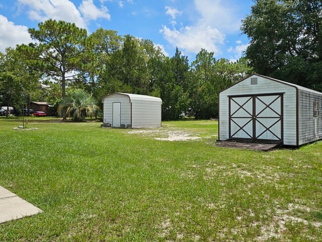 Building Photo - 7096 W Jackson Ln