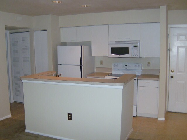 Foto del edificio - PALM LAKE VILLAS