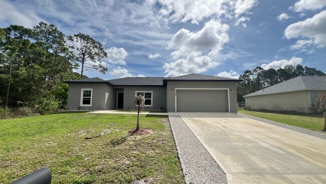 Foto del edificio - AWESOME 3 BD/2BA Home in Beautiful Palm Bay!!