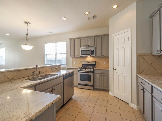 Building Photo - 5511 Wild Milberry Dr