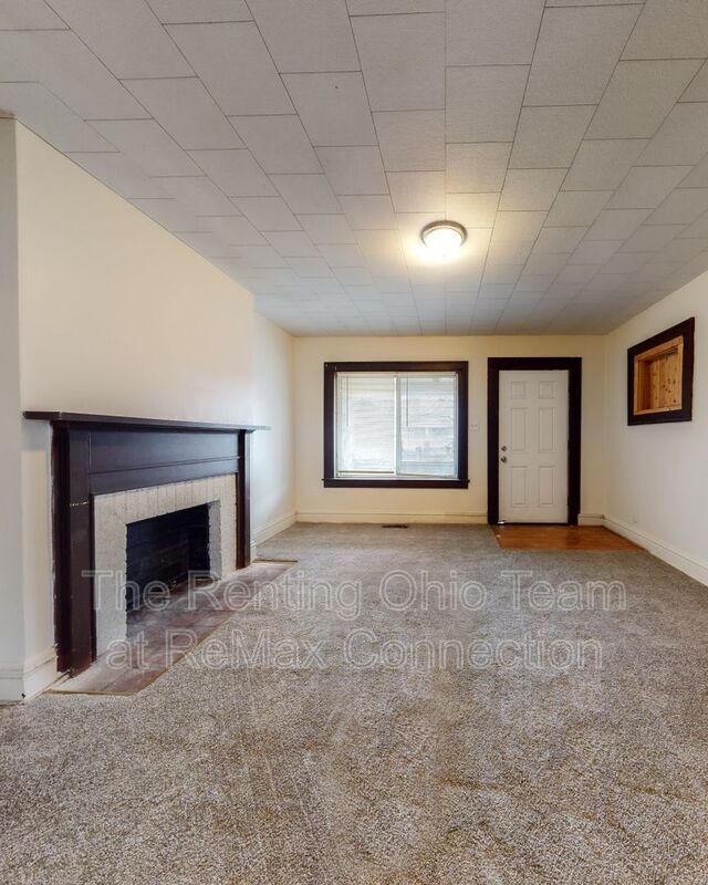 Building Photo - 1042 E 16th Ave
