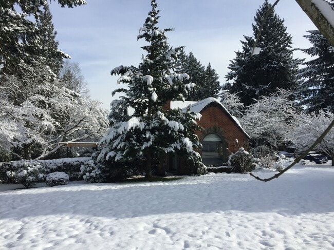 Front exterior during winter with mature trees - 3846 NE Maywood Pl