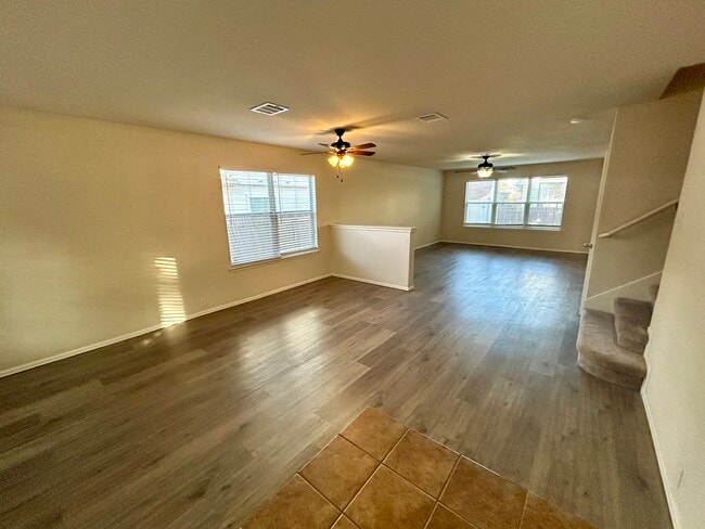 Open Living Room, recently painted and new floors - 1305 Sunflower Ln