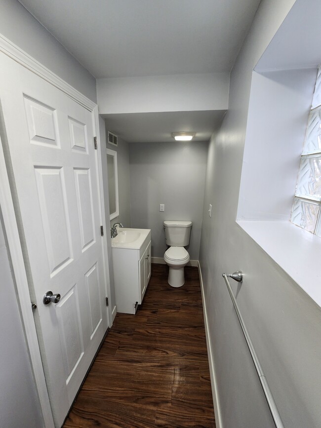 Bathroom - vanity and toilet - 7302 Columbia Ave