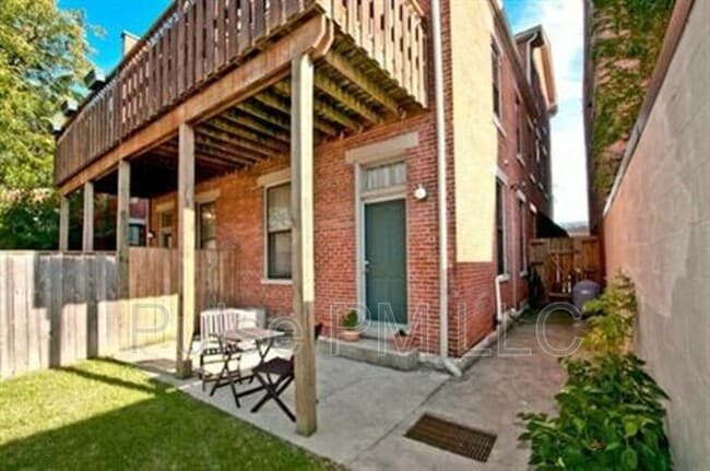 Photo - 112 E 5th St Apartment