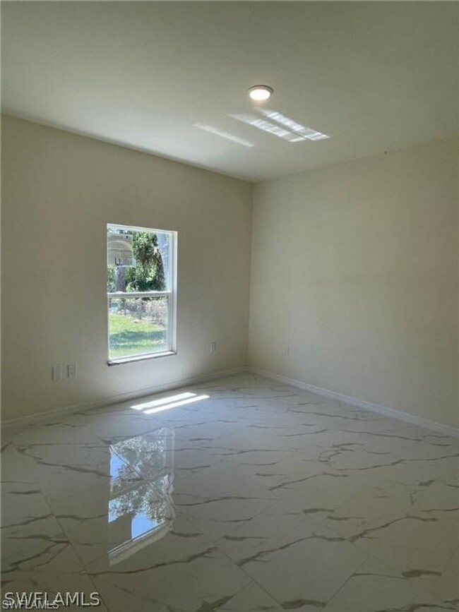 Building Photo - Available Now Three Bedroom 2 bath/ Single...
