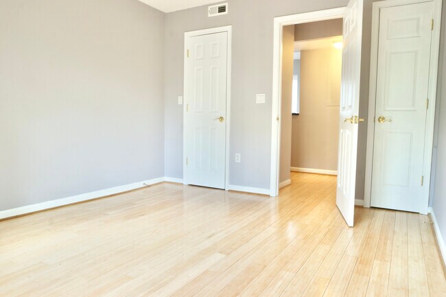 Bedroom showing both closets - 4208 Benning Rd NE
