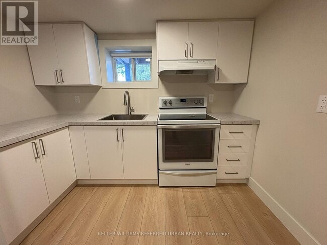 Photo du bâtiment - 113 Almore Ave