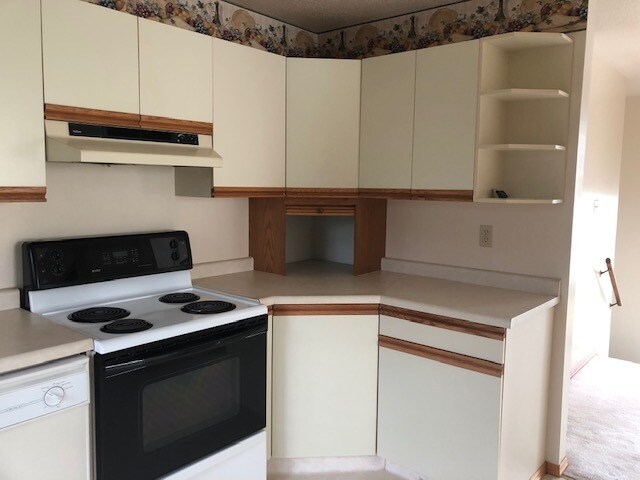 Photo du bâtiment - 2 Bed 1 Bath Unit in Olds, AB