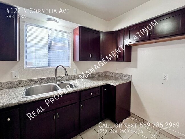 Building Photo - 4122 N Cornelia Ave