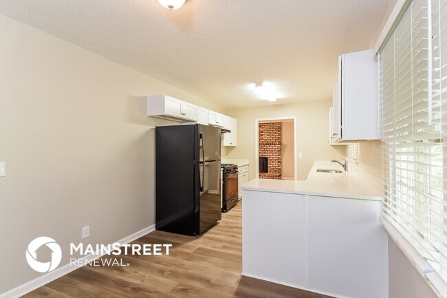 Foto del edificio - 5613 Woodland Dr