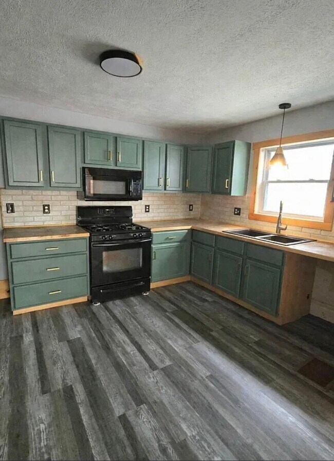 Foto del edificio - 618 Pettibone Ave NW