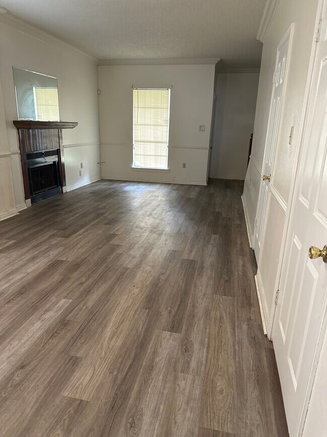 Living room with fireplace - 3310 Oneal Ln Townhome