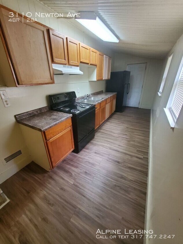 Building Photo - Christian Park 4BR/2BA House w/Garage!