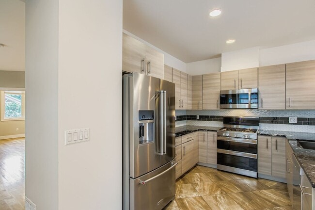 Building Photo - Edge Water Beauty- This is a Must See Home!