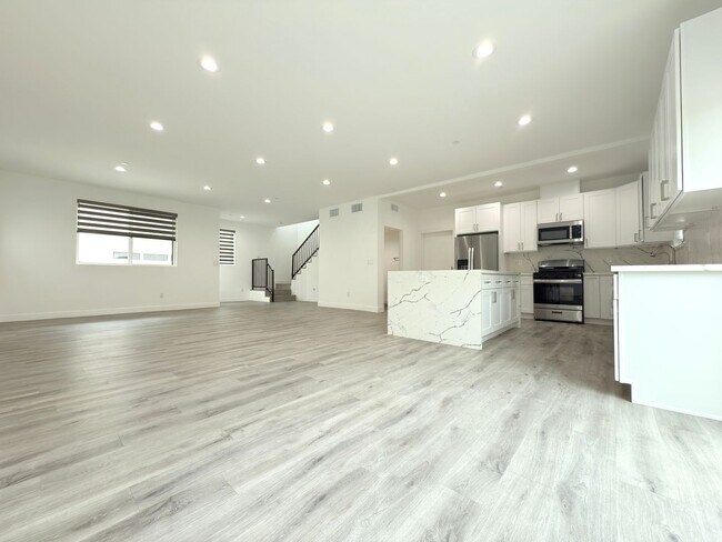 Building Photo - Chic Modern Living in Panorama City – 4 Be...
